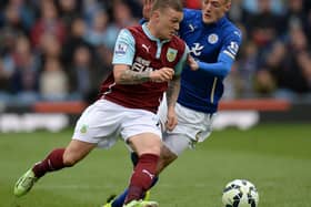 Kieran Trippier battles for the ball with Leicester City striker Jamie Vardy