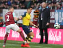 Kieran Trippier vies with Chilean striker Alexis Sanchez during the English Premier League football match between Burnley and Arsenal at Turf Moor on April 11, 2015. AFP PHOTO / LINDSEY PARNABY