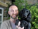 Michael Huckerby, owner of The Lawrence Hotel in Padiham, with his dog Hetty. He has set up a 'pop up' shop at the hotel for the elderly and vulnerable in the community.