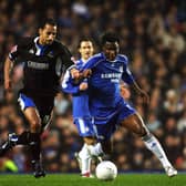 Chelsea's John Obi-Mikel (R) tussles with Macclesfield's Matty McNeil (L) during their F.A Cup third round match at Stamford Bridge in London, 06 January 2007. AFP PHOTO ADRIAN DENNIS