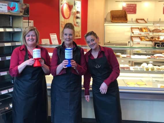 Dawn Grant, Christine Smith and Lisa Tomlinson, from the Padiham Road Oddie's shop in Burnley, have been encouraging shoppers to donate their change