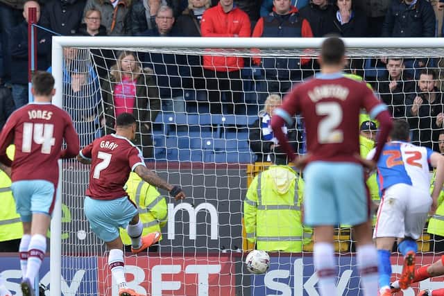 Andre Gray scores the only goal of the game from the spot