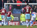 Andre Gray scores the only goal of the game from the spot