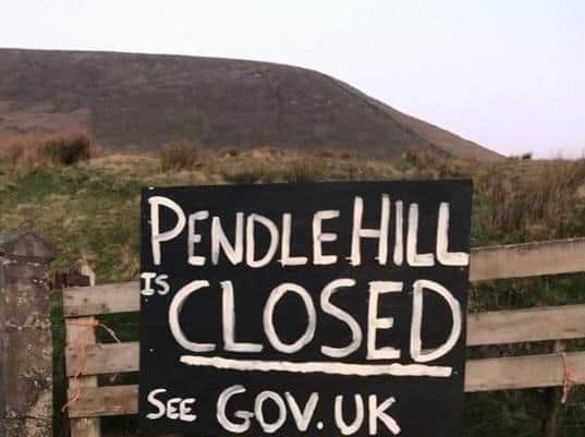 This sign remains in place to deter walkers from going up Pendle Hill after emergncy services were called out on Wednesday evening to rescue a female wh got lost.