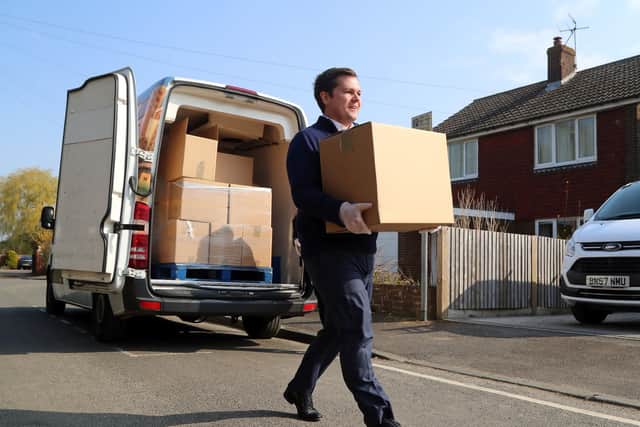 Communities Secretary Robert Jenrick, helped deliver free food boxes to the most clinically vulnerable in Tonbridge, Kent, yesterday, as the scheme is rolled out across England (Picture: Gareth Fuller/PA Wire)