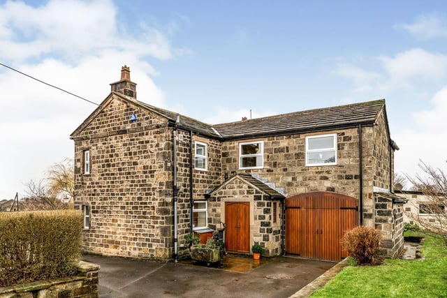 A period stone detached property located on West End Lane.