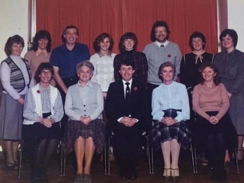 This staff photo was taken in 1984 and features caretaker Harry Mason and ancillary helper, a role now referred to as teaching assistant, Edna Nuttall.