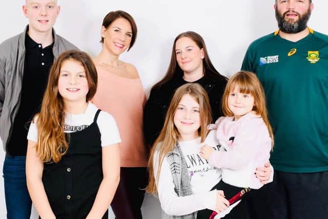 Mum of five Beth Schinkel, who plans to run 186 miles in 30 days to raise money for PPE, with her husband Getty and their children (left to right) William and Megan and (front) Hayden, Annie and Maggie.