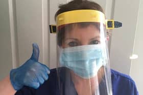 Former St Hildas RC High pupil Dr Jill Davies, wearing one of the visors made at Burnley's Blessed Trinity RC College. Dr Davies works for the GP Federation LPC in Blackburn with Darwen.