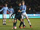 Kane Paterson of Burnley on the ball with Cole Palmer of Manchester City during the FA Youth Cup match between Manchester City and Burnley at The Academy Stadium on March 4th