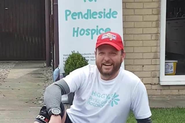 Andy Higginson takes a well deserved rest after raising almost 2,000 for Pendleside Hospice after running the London Marathon at his home in Burnley.