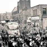 Burnley leaving Turf Moor, travellling down Yorkshire Street towards the town centre on their parade, after being crowned First Division champions in 1960