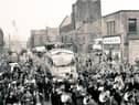 Burnley leaving Turf Moor, travellling down Yorkshire Street towards the town centre on their parade, after being crowned First Division champions in 1960