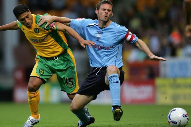 Former Preston North End captain Graham Alexander battles for the ball