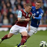 Former Burnley defender Kieran Trippier battles with Leicester City striker Jamie Vardy