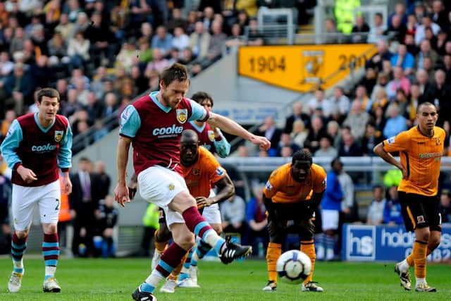 Graham Alexander of Burnley scores his team's third goal from a penalty during the Barclays Premier League match between Hull City and Burnley at the KC Stadium on April 10, 2010 in Hull, England. (Photo by Jamie McDonald/Getty Images)
