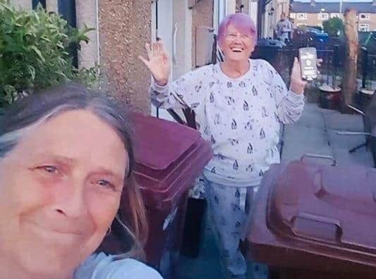 Watching the line up of acts on Burnley's Got Talent is a weekend ritual for Sylvia Box (back) whose daughter Shelly Heap is one of the competition organisers. Neighbour Linda Jopson and other residents also like joining in to cheer on the contestants.