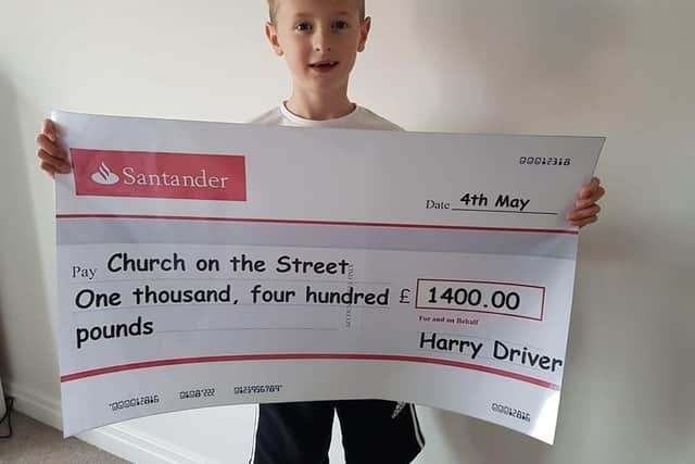 Champion fund raiser Harry Driver has used his love of running to help raise money for families struggling to cope during the pandemic.