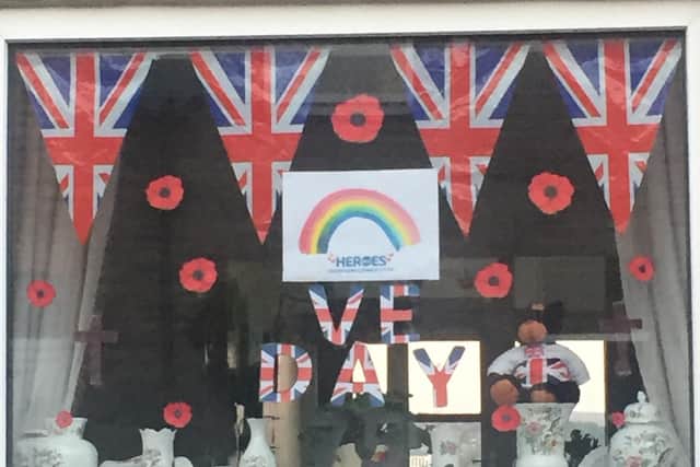 One of the windows bedecked in Fence for VE Day 75th anniversary