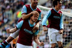 Graham Alexander of Burnley celebrates with his team mates after scoring his team's second goal from a penalty during the Barclays Premier League match between Hull City and Burnley at the KC Stadium on April 10, 2010 in Hull, England. (Photo by Jamie McDonald/Getty Images)