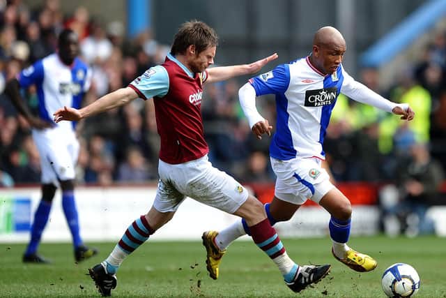 El-Hadji Diouf of Blackburn battles with Graham Alexander of Burnley during the Barclays Premier League match between Burnley and Blackburn Rovers at Turf Moor on March 28, 2010 in Burnley, England. (Photo by Laurence Griffiths/Getty Images)