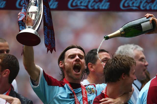 Graham Alexander of Burnley celebrates victory with the trophy during the Coca-Cola Championship Playoff Final between Burnley and Sheffield United at Wembley Stadium on May 25, 2009 in London, England. (Photo by Jamie McDonald/Getty Images)