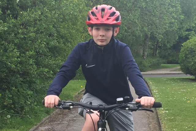 Lewis Glass has ridden the equivalent of three marathons on his bike to raise money for the NHS