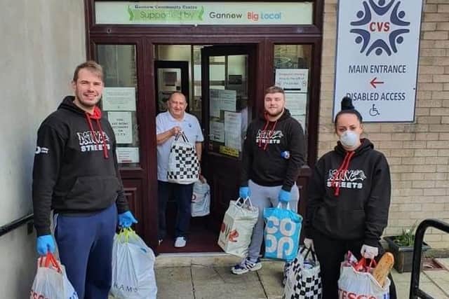 Volunteers with the Burnley, Pendle and Rossendale Council for Voluntary Service (BPRCVS) prepare to go on food delivery rounds