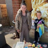 Lexa and Harlow with their rainbow-themed rocks stall