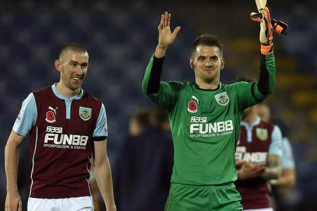 Tom Heaton and David Jones of Burnley celebrate at full-time following the Barclays Premier League match between Burnley and Hull City at Turf Moor on November 08, 2014. (Photo by Chris Brunskill/Getty Images)