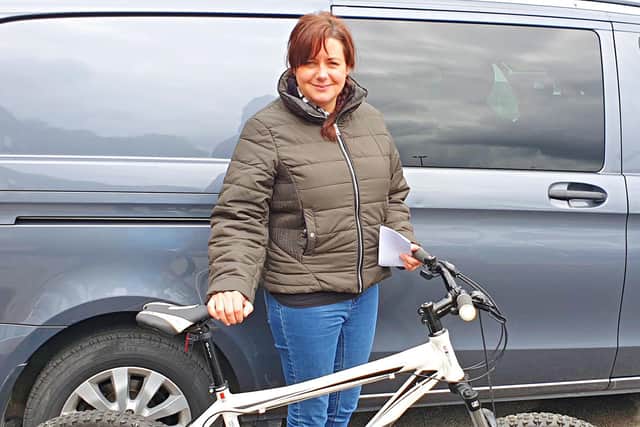 Joanne Cooper, Critical Care Nurse at Royal Blackburn Hospital, collecting her newly serviced bike