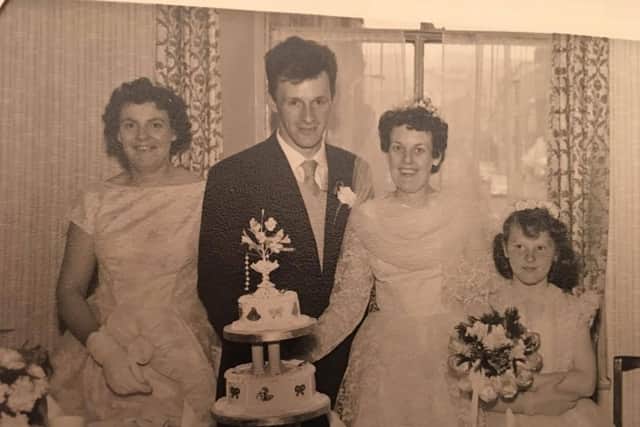 Geoff and Dot on their wedding day with Dorothy's sister Margaret (left) and Geoff's niece Jennifer, as bridesmaids.