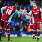 Graham Alexander of Burnley is congratulated by team mate Chris McCann after scoring from the penalty spot during the FA Cup 4th Round match between West Bromwich Albion and Burnley at The Hawthorns on January 24, 2009. (Photo by Clive Mason/Getty Images)