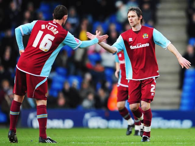 Graham Alexander of Burnley is congratulated by team mate Chris McCann after scoring from the penalty spot during the FA Cup 4th Round match between West Bromwich Albion and Burnley at The Hawthorns on January 24, 2009. (Photo by Clive Mason/Getty Images)