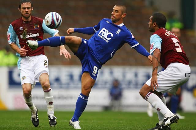 Kevin Phillips of Birmingham wins the ball ahead of Graham Alexander and Clarke Carlise of Burnley during the Coca-Cola Championship match between Burnley and Birmingham City at Turf Moor on October 18, 2008. (Photo by Matthew Lewis/Getty Images)