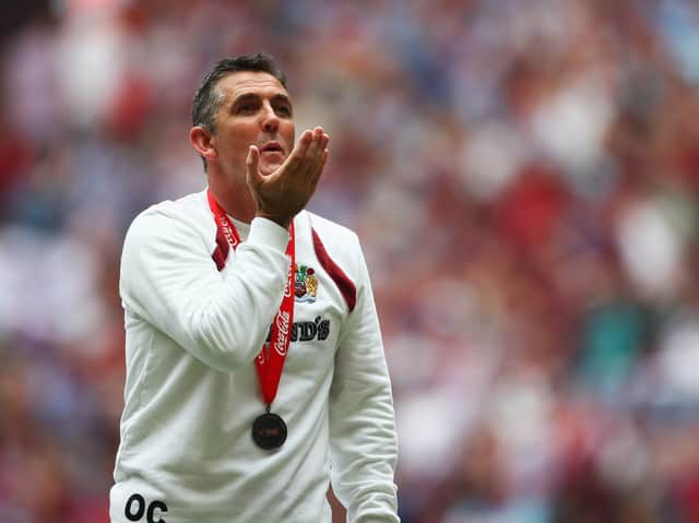 Burnley Manager Owen Coyle celebrates victory during the Coca-Cola Championship Playoff Final between Burnley and Sheffield United at Wembley Stadium on May 25, 2009 in London, England. (Photo by Jamie McDonald/Getty Images)