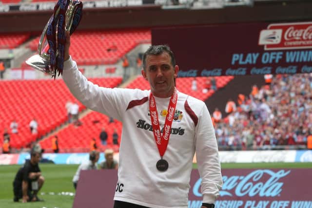 Former Burnley boss Owen Coyle celebrates victory over Sheffield United in the Championship play-off final at Wembley Stadium in 2009