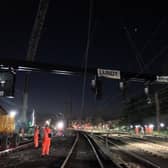 A gantry is being replaced at the station Credit:  Network Rail
