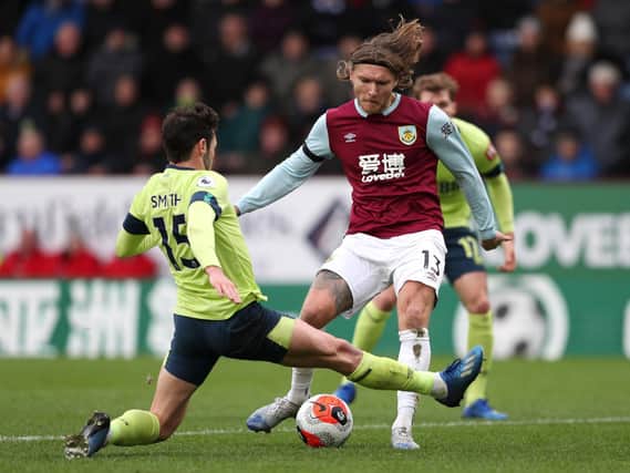 Jeff Hendrick of Burnley has a shot blocked by Adam Smith of AFC Bournemouth during the Premier League match between Burnley FC and AFC Bournemouth at Turf Moor on February 22, 2020 in Burnley, United Kingdom. (Photo by Jan Kruger/Getty Images)
