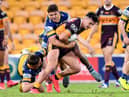 Herbie Farnworth of the Broncos attempts to break away from the defence during the round three NRL match between the Brisbane Broncos and the Parramatta Eels at Suncorp Stadium