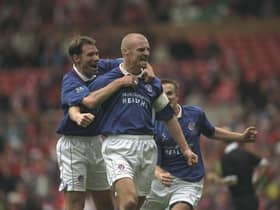 Sean Dyche of Chesterfield receives the congratulations for his goal during the FA Cup Semi-Final against Middlesbrough at Old Trafford in Manchester, England. The game was drawn 3-3. Credit: Clive Brunskill /Allsport