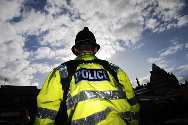 Police have arrested a man for brandishing a weapon in road in Burnley last night.