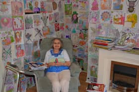 Jacqueline Floyd at home with her colouring
