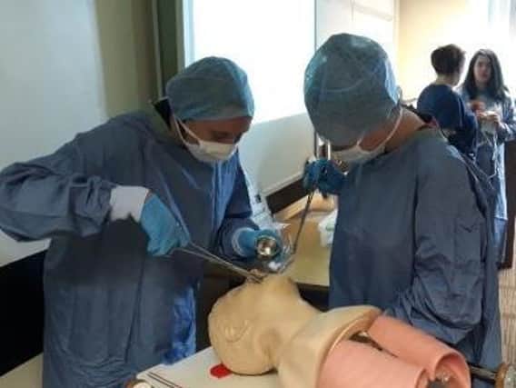 Burnley College health and social care students at Burnley College Sixth Form Centre gaining hands-on experience in a hospital training session as part of their studies (images were captured before Covid-19 restrictions imposed)