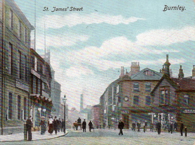 The postcard shows part of St Jamess Street in Burnley