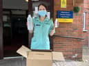 Receiving the UCLan-made  sanitiser at Preston Grange