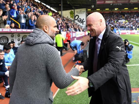 Burnley boss Sean Dyche and Manchester City manager Pep Guardiola