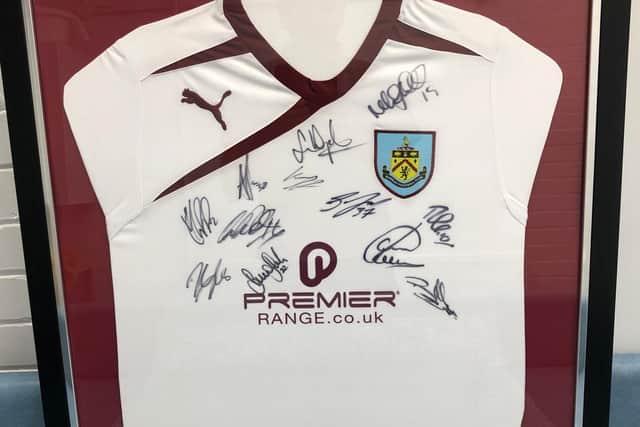 The signed Burnley FC shirt that is up for grabs