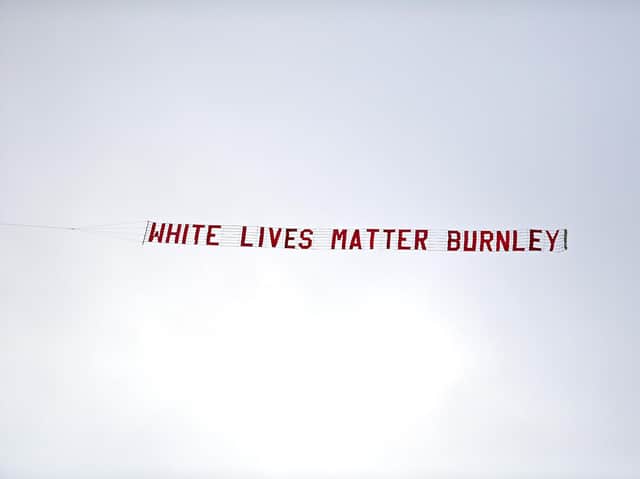 The banner flown over the stadium on Monday