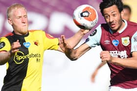 Watford's English midfielder Will Hughes (L) fights for the ball with Burnley's English midfielder Dwight McNeil during the English Premier League football match between Burnley and and Watford at Turf Moor in Burnley, north west England on June 25, 2020. (Photo by PETER POWELL / POOL / AFP)